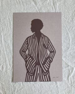 Papirklip af Kvinde i stribet jakkesæt, brune toner