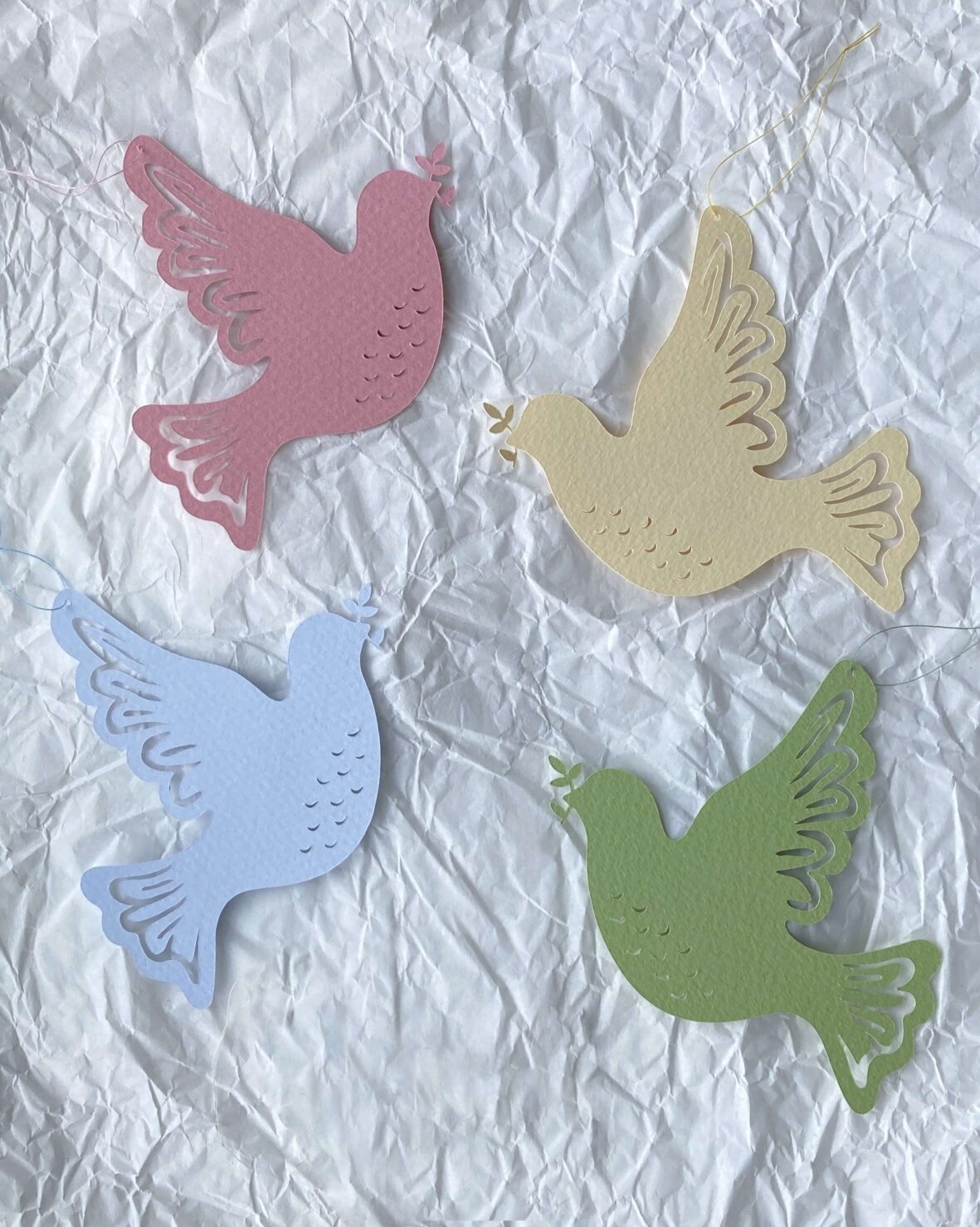 papirpynt, papirklip, fredsduer, pastelfarver